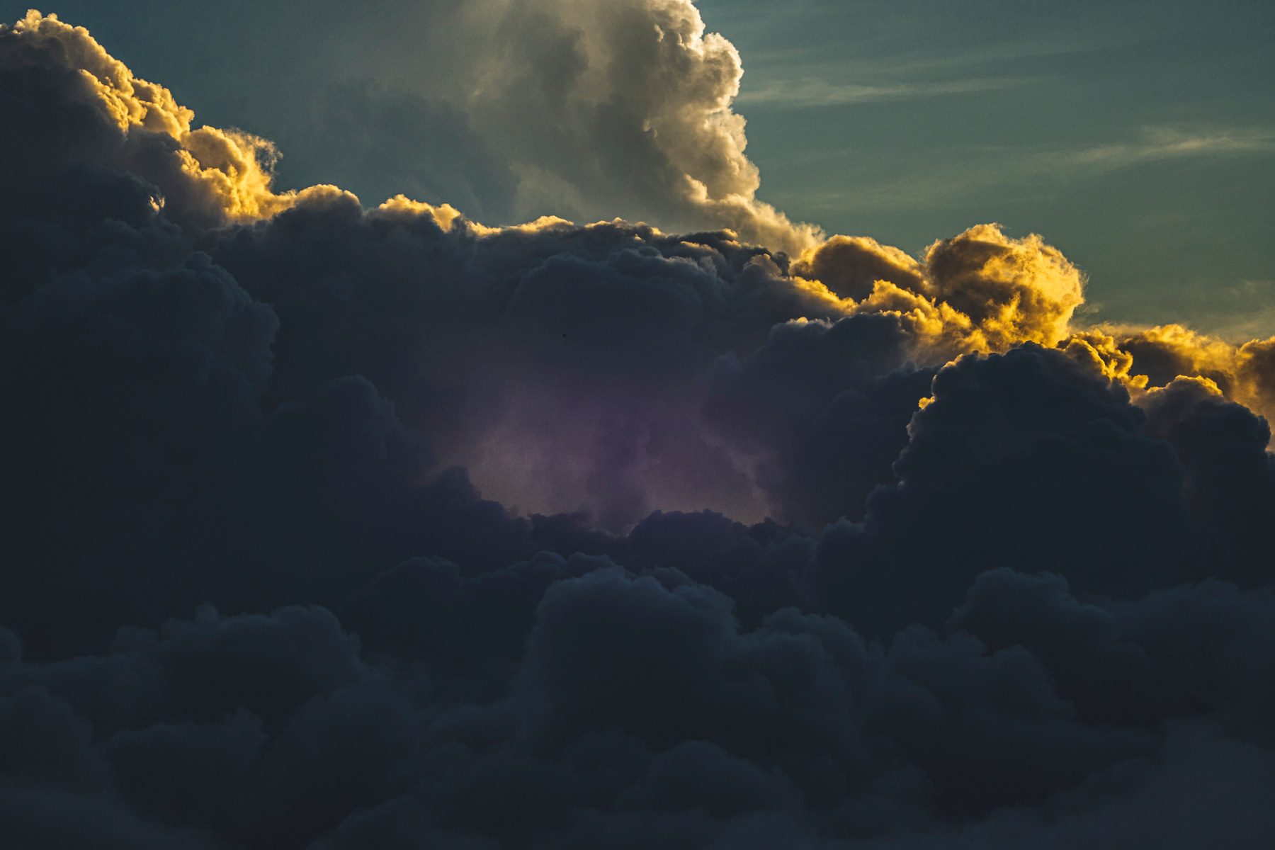 Storm cloud with the sun behind it